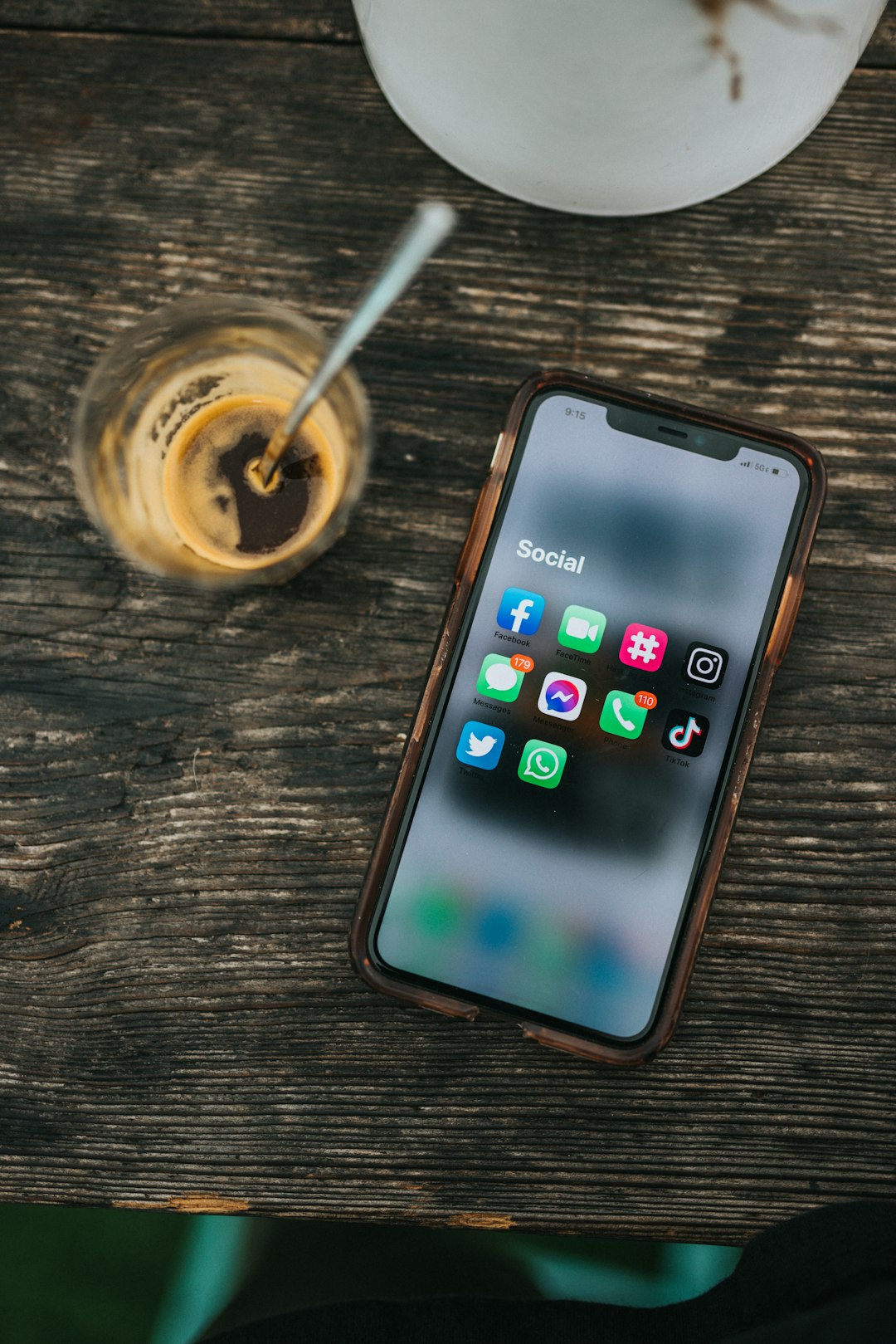 white-samsung-android-smartphone-on-brown-wooden-table-klmt1mpgjvg